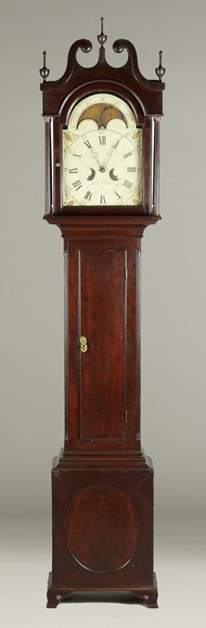 PA Cherry Tall Case: PA Cherry Tall Case. Reeded columns & bracket base, old finish. Painted iron dial. Later signature added: Jacob Hostetter. 8 day time and strike weight driven brass movement w/moon phase dial. Brass m