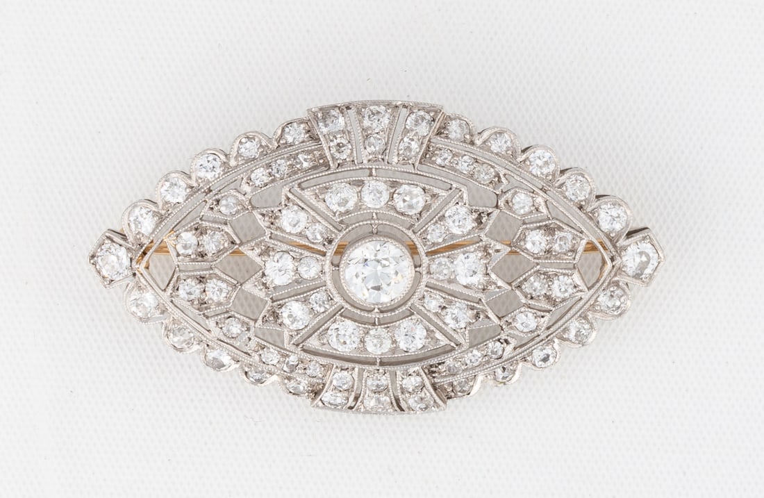 14K Gold & Diamond Art Deco Brooch: 14K Gold & Diamond Art Deco Brooch Total diamond weight: 2.41 carats. F-G color. VS-I1 clarity. Containing one old European cut center diamond (.48 cts) and seventy-six round diamonds (1.93 cts).