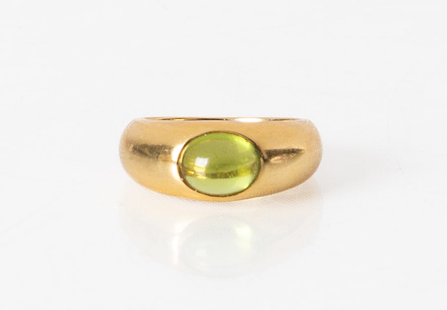 Tiffany & Co. 18K Gold & Cabochon Peridot Ring: Tiffany & Co. 18K Gold & Cabochon Peridot Ring Weight: 8.3 grams. Ring size: 6 Shipping Note: We provide our own in-house shipping service; separate from LiveAuctioneers. Please reach out to us
