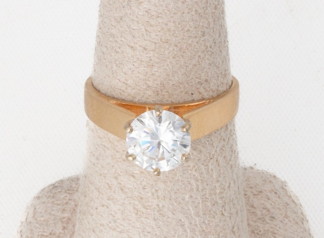 1.25 Carat Diamond Solitaire Ring: 1.25 Carat Diamond Solitaire Ring I color, SI-1 clarity. Measures 7.05-7.16 by 4.10 mm. 14K gold. Ring size: 5 Estate of Nathaniel Hoyt Thomas of Buffalo & Rochester, New York. Shipping Note: We