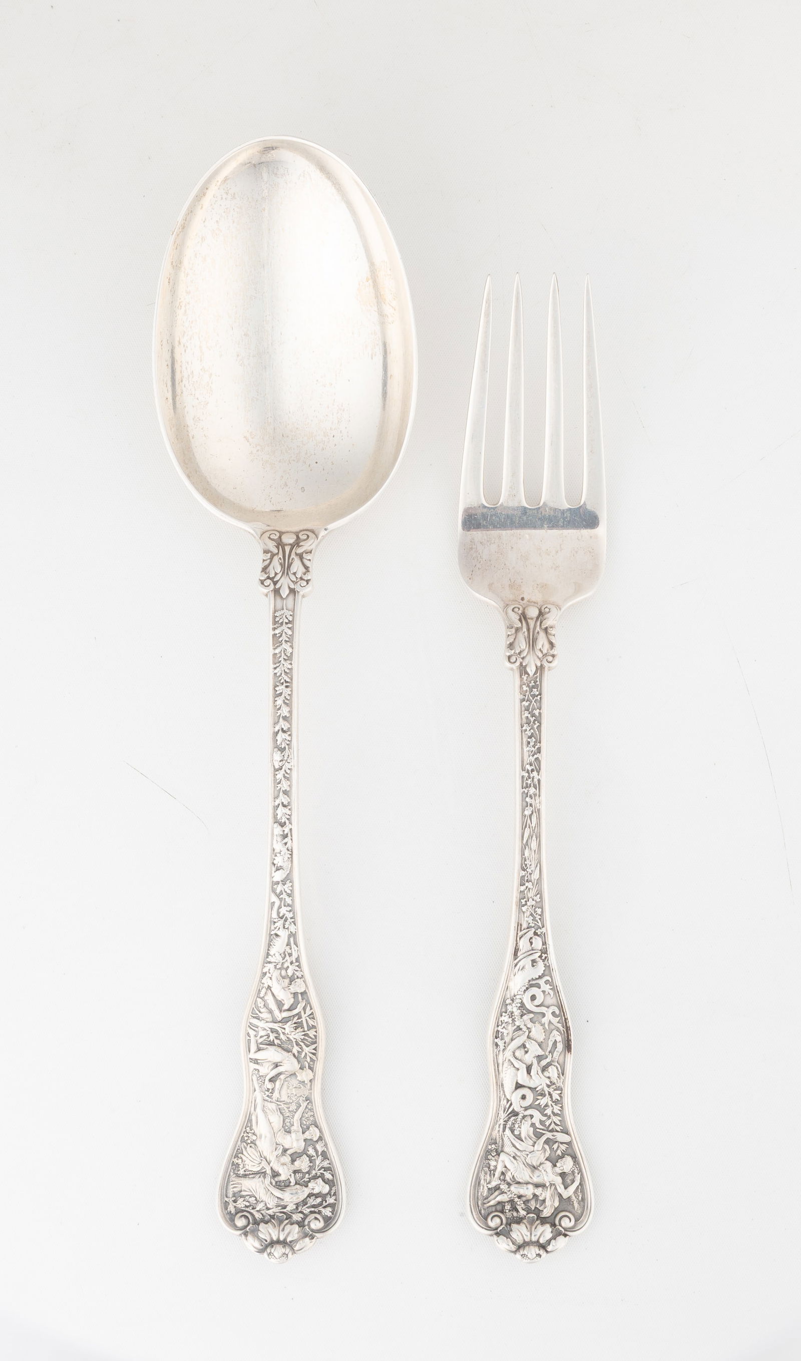 Tiffany & Co. Olympian Serving Pieces: Tiffany & Co. Olympian Serving Pieces Total weight: 7 troy ounces. Max L. 9 5/8 in. Estate of Nathaniel Hoyt Thomas of Buffalo & Rochester, New York. Shipping Note: We provide our own in-house