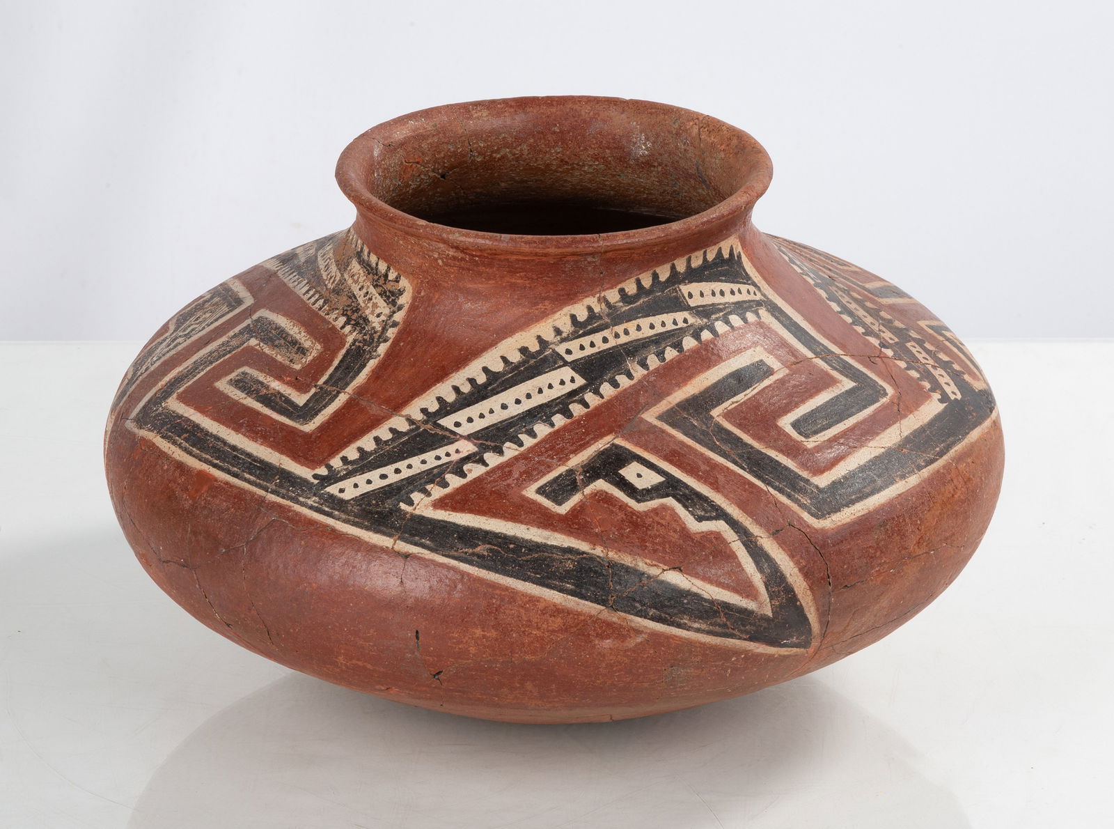 Tonto Polychrome Olla: Tonto Polychrome Olla Anasazi / Ancestral Puebloan, Greater Mogollon, Greater Salado. 9 x 16 in. Shipping Note: We provide our own in-house shipping service; separate from LiveAuctioneers. Please