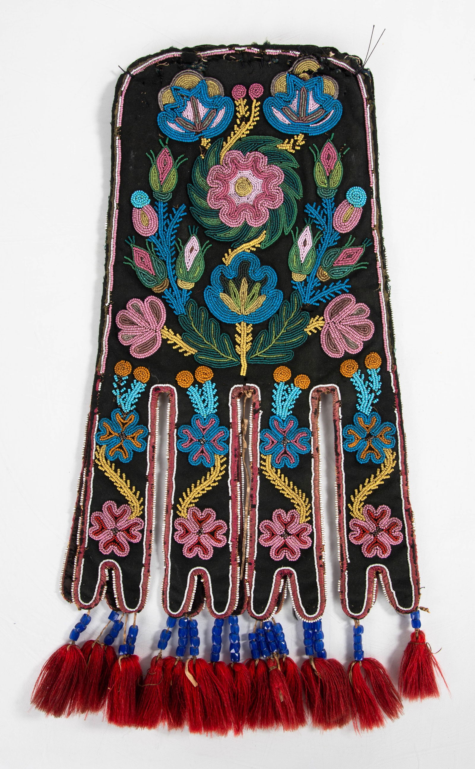 Native American Metis Octopus Bag: Native American Metis Octopus Bag Circa 1870. L. 18 in. Shipping Note: We provide our own in-house shipping service; separate from LiveAuctioneers. Please reach out to us directly with any