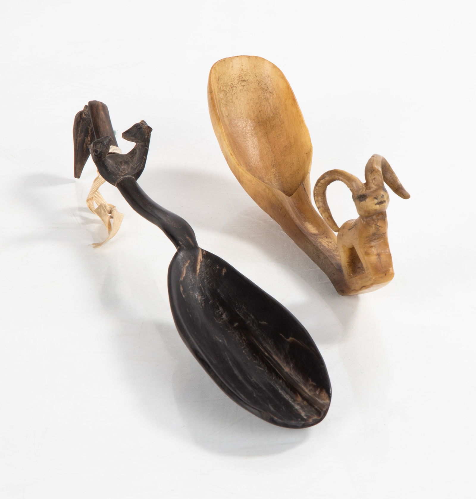 Native American Buffalo & Sheep's Horn Spoons: Native American Buffalo & Sheep's Horn Spoons Early 20th century. L. 10 1/2 in. Shipping Note: We provide our own in-house shipping service; separate from LiveAuctioneers. Please reach out to us