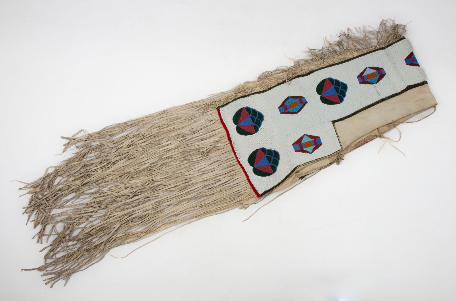 Plateau Nez Perce Saddle Throw: Plateau Nez Perce Saddle Throw Early 20th century. L. 116 in. Shipping Note: We provide our own in-house shipping service; separate from LiveAuctioneers. Please reach out to us directly with any