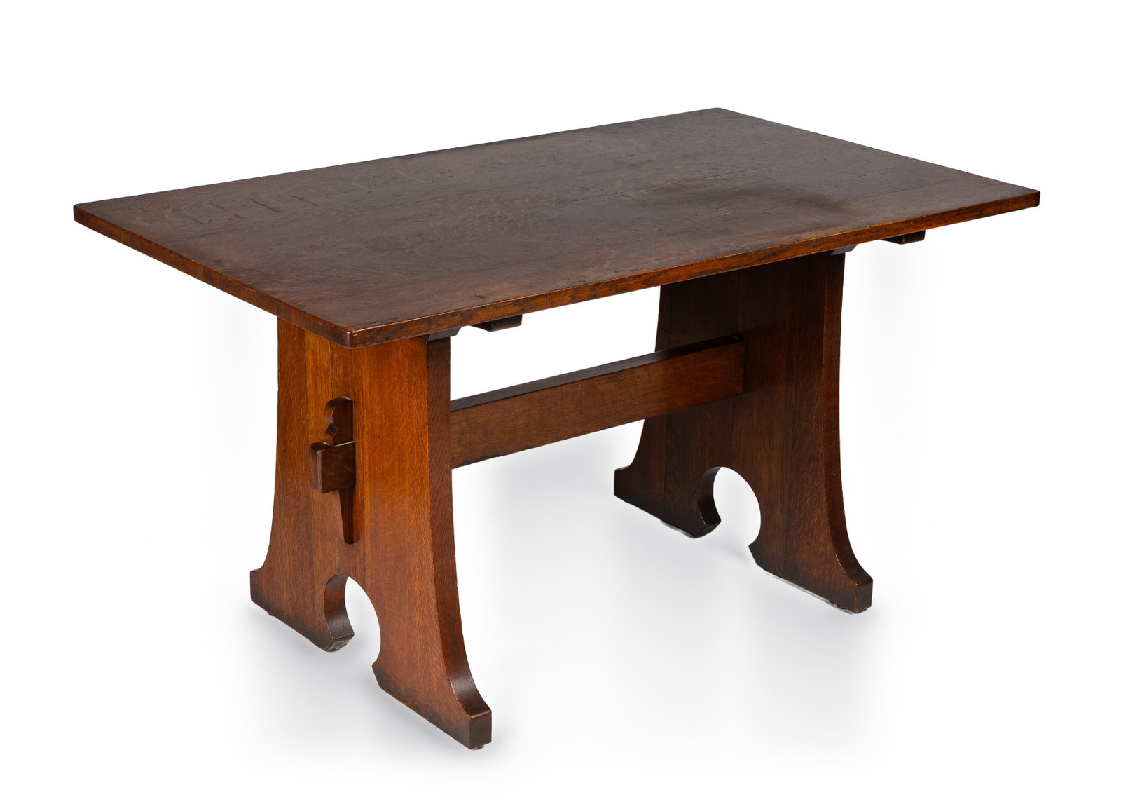L. & J.G. Stickley, A Trestle Table, Model No. 599: L. & J.G. Stickley, A Trestle Table, Model No. 599 Fayetteville, New York, circa 1912-1918. Quarter-sawn oak. Decal to the underside of a trestle standard, 'THE WORK OF L. & J.G. STICKLEY' within a co