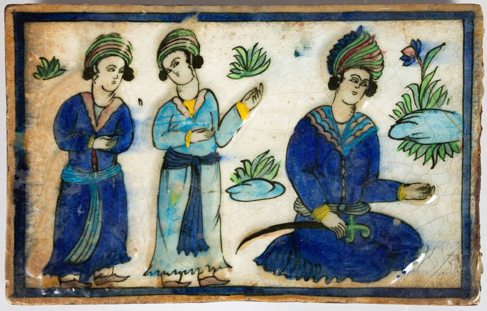 19th Century Persian Qajar Pottery Tile: 19th Century Persian Qajar Pottery Tile Persia, 19th century. Earthenware painted in underglaze cobalt blue, turquoise, green, manganese black, ochre and yellow beneath a clear crackled glaze. The