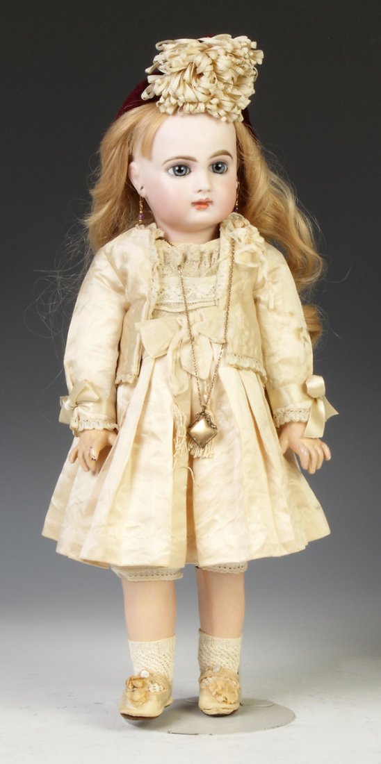 French Jumeau Doll: French Jumeau Doll. Marked E7J. Jointed composition body & shoes marked Jumeau. Blown paperweight eyes, pierced ears. Syracuse, NY, Family. Ht. 17"