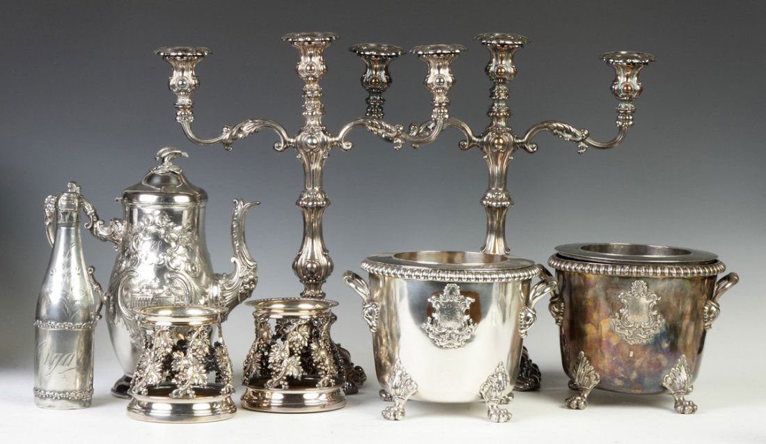 Group of Silver Plate incl. Sheffield: Group of Silver Plate incl. Sheffield. Waldorf 'Cigars' decanter, engraved, dents; Victorian repousee coffee pot; pr. Candelabras; pr. Wine coasters; wine coolers Property of the Strong, sold to benef