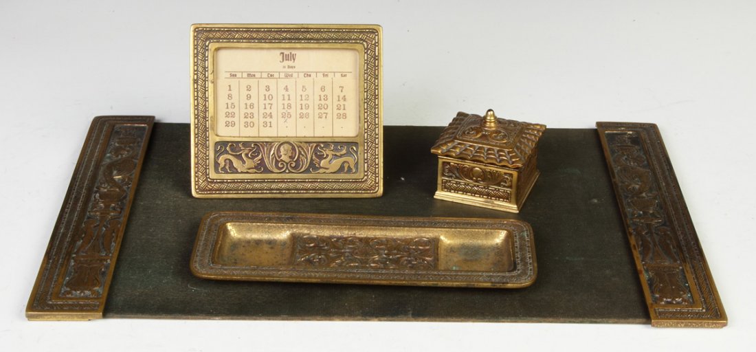 Unusual Gilded Bronze Tiffany Studios Desk Set: Unusual Gilded Bronze Tiffany Studios Desk Set. #1893 & 1881. Inkwell, calendar, blotter ends, tray.