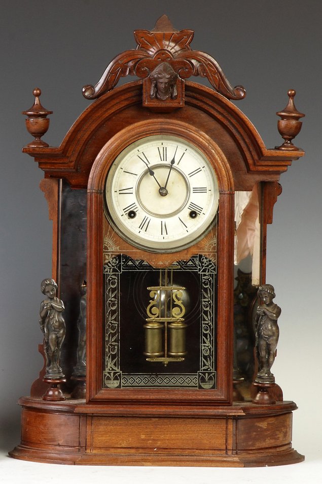 Ansonia Victorian Mirror Side Shelf Clock: Ansonia Victorian Mirror Side Shelf Clock. Walnut case; refinish & some restorations to case, loss to crest. Original paper dial. Original glass. 8 day time & strike spring driven brass movement. Ht. 