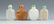 Four Chinese Hardstone & Glass Snuff Bottles