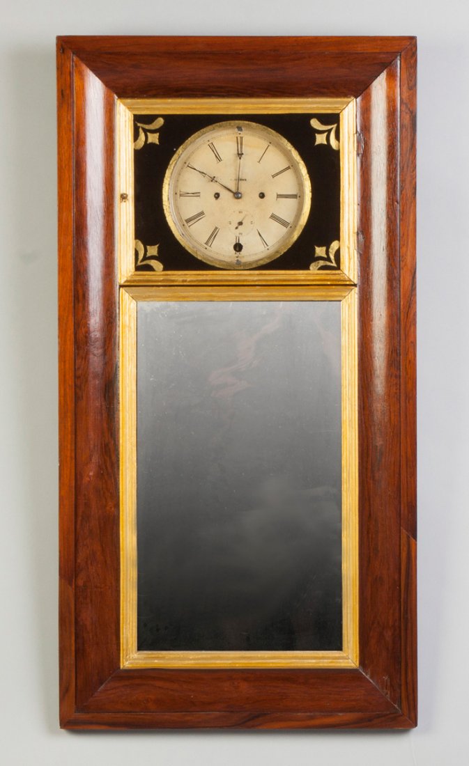 Chauncey Jerome Mirror Clock: Chauncey Jerome Mirror Clock. Rosewood case, doors over-gilded. Upper glass repainted. Painted metal dial. Balance wheel movement. Ht. 43".