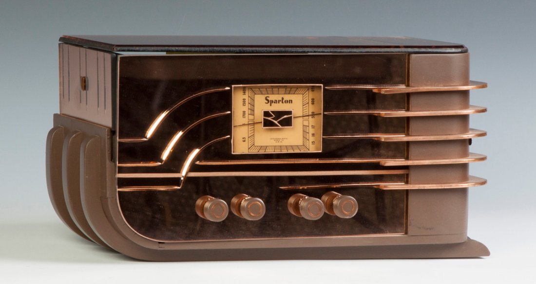 Sparton Glass & Plasticor Bakelite Sled Mirror Radio,: Sparton Glass & Plasticor Bakelite Sled Mirror Radio, Model 558C. Walter Teague design. Copper toned glass. Ht. 9" W 17" D 8 1/2".
