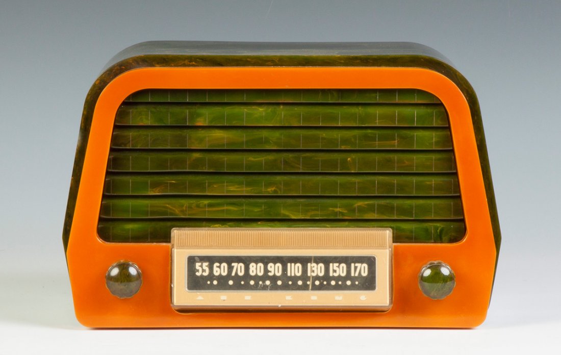 Airking Duchess Radio, Model A-600: Airking Duchess Radio, Model A-600. C. 1946. Green & pumpkin. Ht. 8" W 13" D 7".