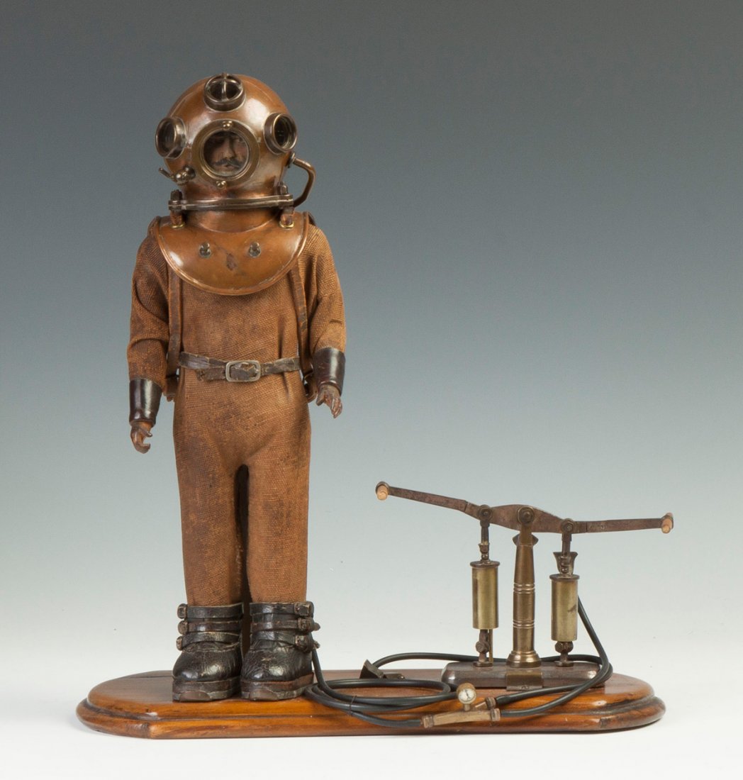 Very Rare Deep Sea Diver Patent Model: Very Rare Deep Sea Diver Patent Model. Mid 19th cent. Denayrouze 3-bolt diving apparatus with regulator and ‘Pompe Hydraulique’. Copper, brass, wood, cloth Ht. 15" W 14" D 6 1/2". Property of the