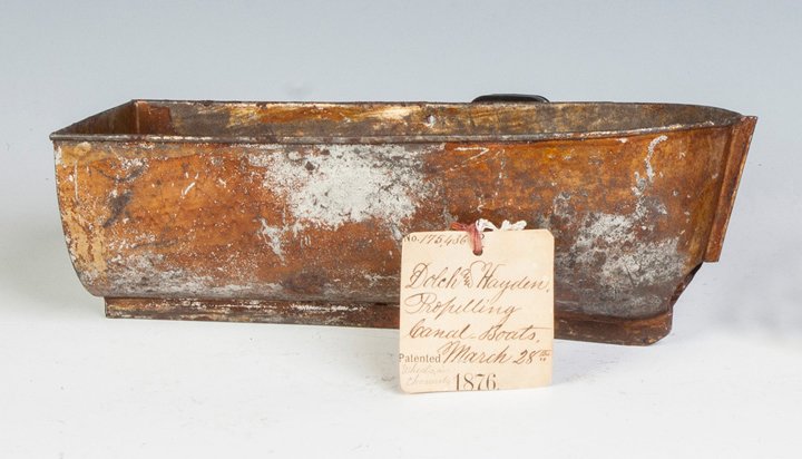 Dolch & Hayden Tin Propelling Canal Boat Patent Model: Dolch & Hayden Tin Propelling Canal Boat Patent Model. C. 1876. Ht. 4" L 12". Property of the Strong, sold to benefit the museum's collections fund.