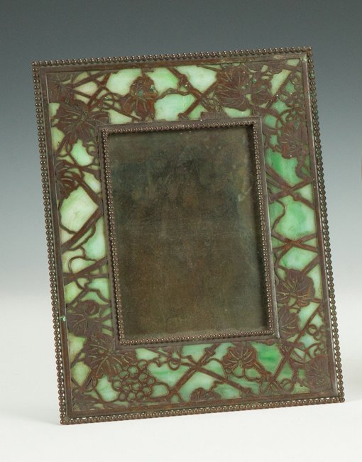 Tiffany Studios Bronze & Glass Frame - Grapevine: Tiffany Studios Bronze & Glass Frame - Grapevine Pattern. Sgn. Tiffany Studios NY. 9 1/2" x 7 1/2. Descended in the Wadsworth - Strong Family, Geneseo, NY.