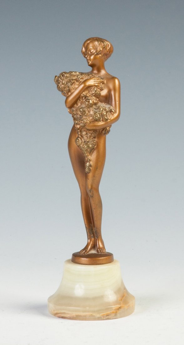 Josef Lorenzl (Austrian, 1892-1950) Bronze Sculpture: Josef Lorenzl (Austrian, 1892-1950) Bronze Sculpture of a Nude Girl Holding Flowers on an Onyx Base. Sgn. Lorenzl. Ht. 7". Richard Bright and Kyle Goodman Collection, Corning, NY.