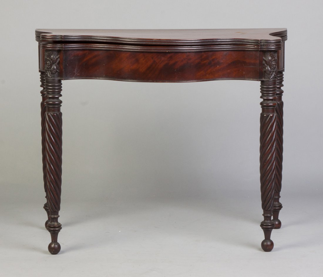 MA Sheraton Serpentine Card Table: MA Sheraton Serpentine Card Table. Early 19th cent. Figured mahogany. Floral carving & twisted legs. Ht. 29" W 36" D 17 1/2" (closed).