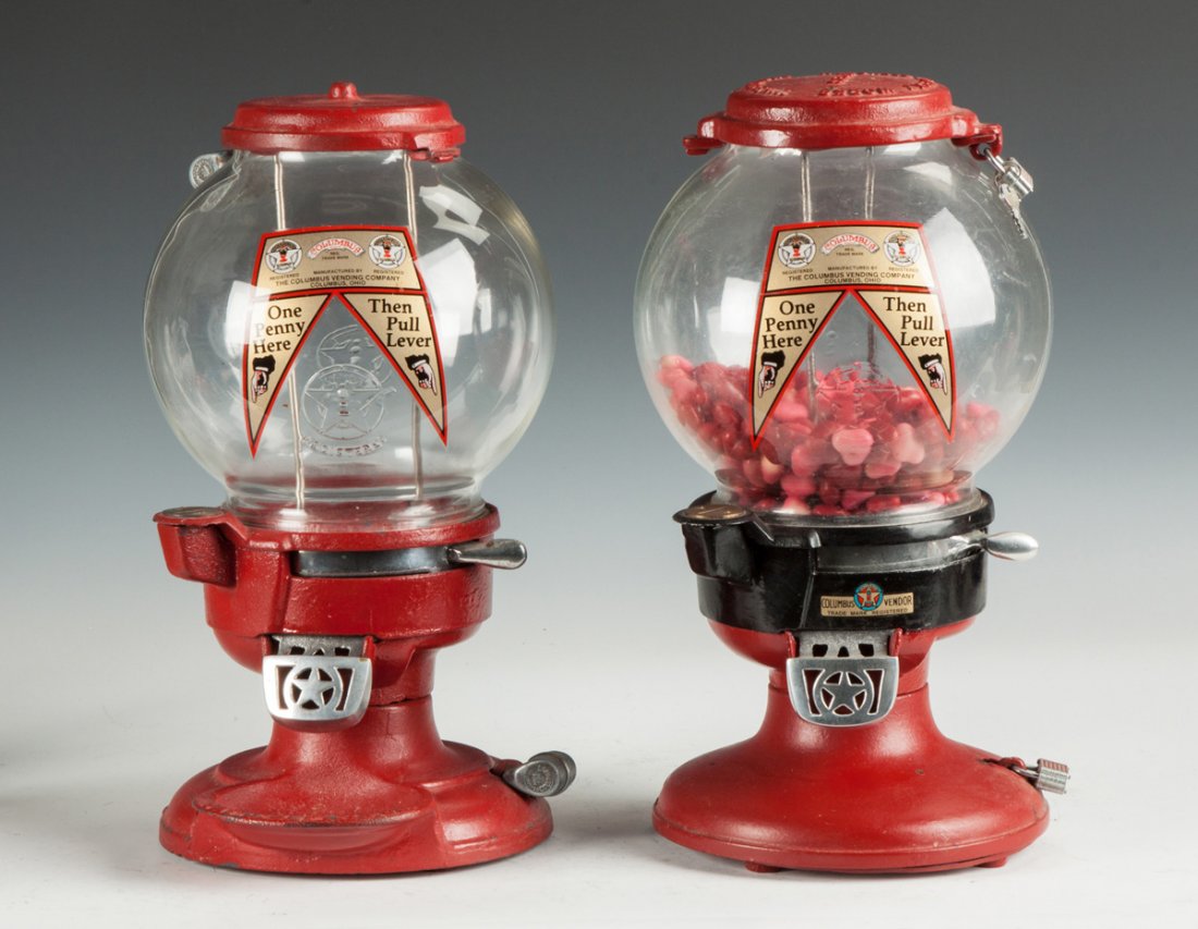Two Vintage Columbus Vending Co., Gumball Machines: Two Vintage Columbus Vending Co., Gumball Machines. Cast iron. Ht. 15" The Dr. Richard & Jill Pope Collection.