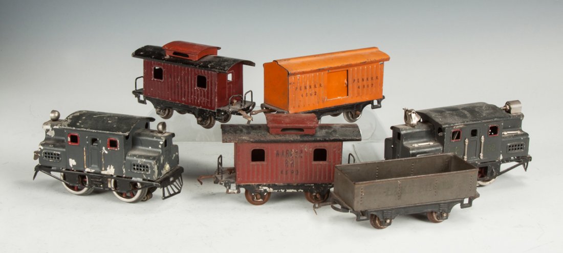 Six Lionel 'O' Gauge Engines & Cars: Six Lionel 'O' Gauge Engines & Cars. Two engines, one #152; two caboose's. Boxcar 4862; open boxcar. The Dr. Richard & Jill Pope Collection.