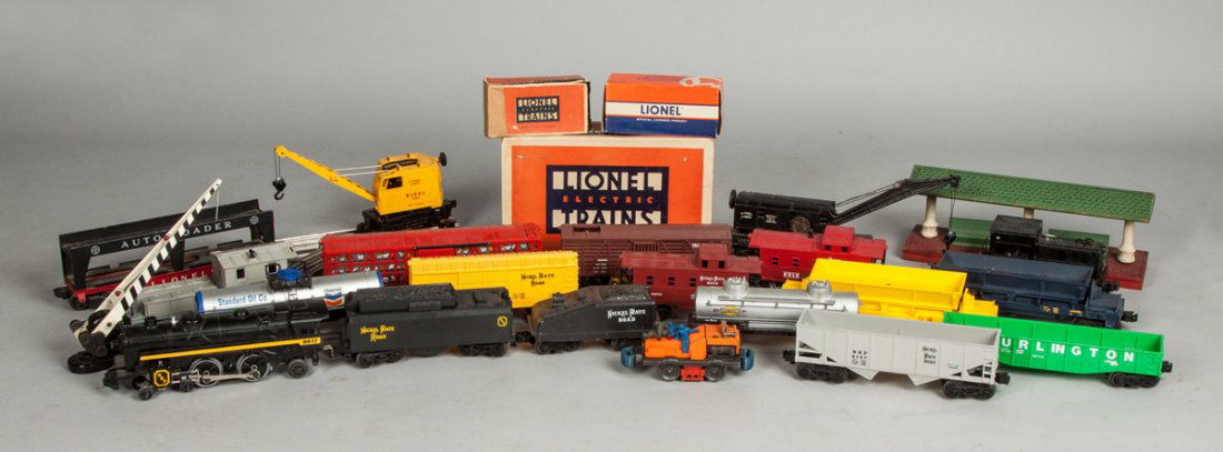 Large Group of Post-War Lionel & Nickle Plate Road: Large Group of Post-War Lionel & Nickle Plate Road Train Cars & Accessories. Together with two boxes of Flex-i-track. The Dr. Richard & Jill Pope Collection.