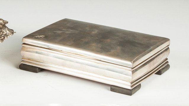 Silver Covered Dresser Box: Silver Covered Dresser Box. Wood liner. Ht. 2 1/2" W 8 1/2" D 6" The Dr. Richard & Jill Pope Collection.