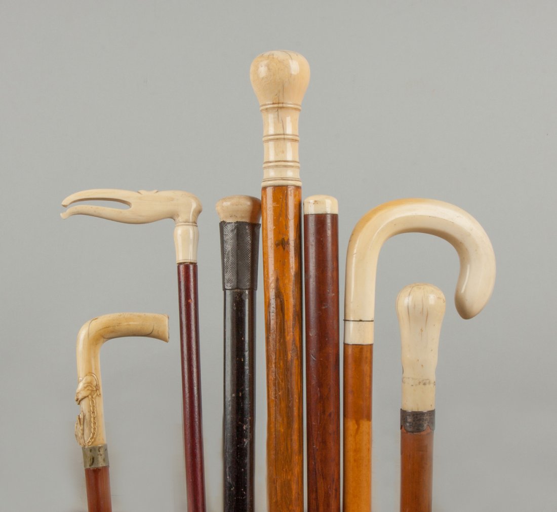 Seven Wood Canes with Carved Handles (1 of 2)