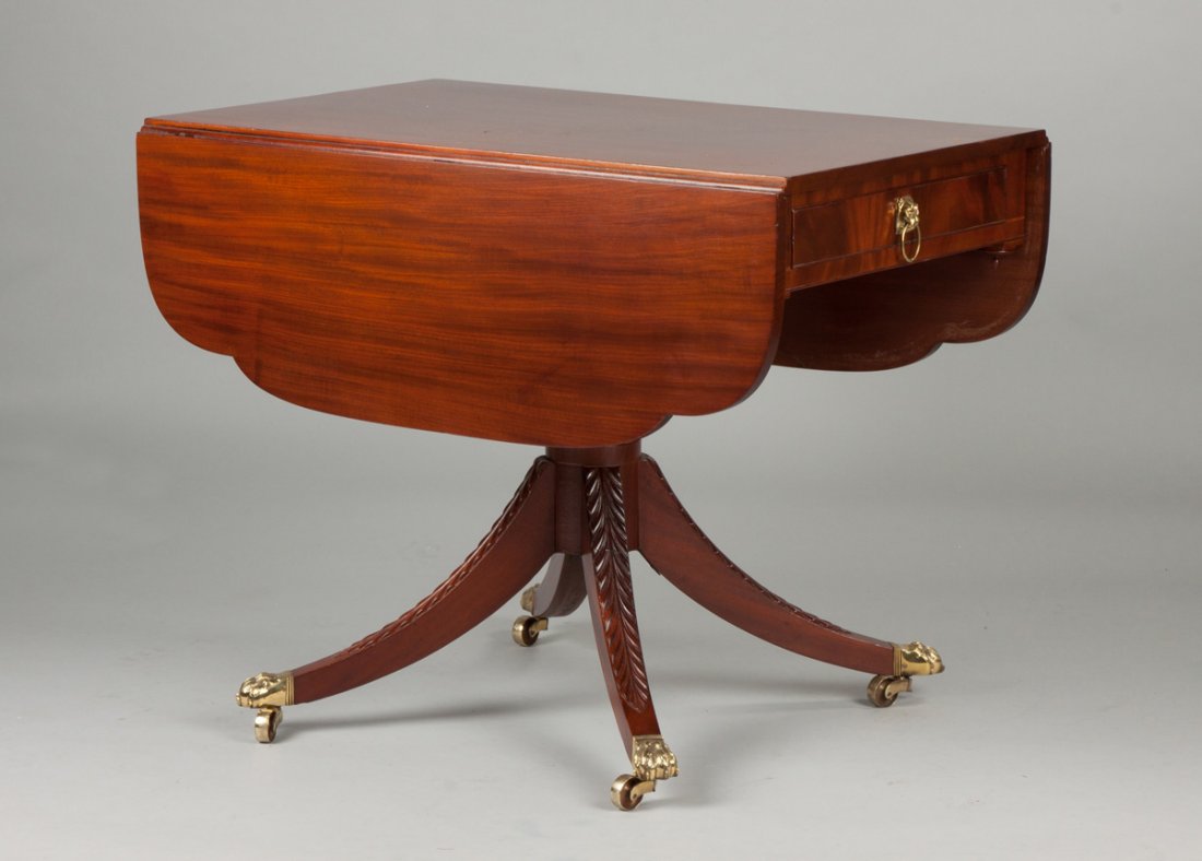 New York Mahogany Drop Leaf Table with Drawer: New York Mahogany Drop Leaf Table with Drawer. C. 1820. School of Duncan Phyfe. Shaped leaves, acanthus carved legs, brass paw feet. Ht. 30" W (open) 49" W 37 1/2". A Private Collection.