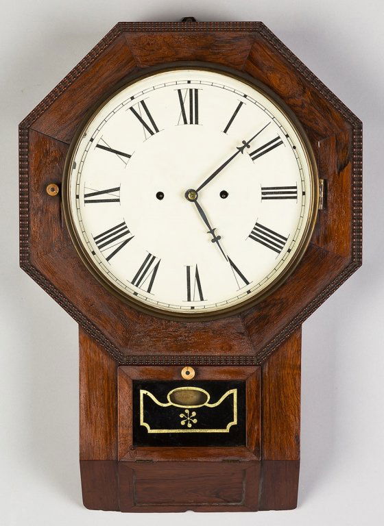 Atkins Clock Co. Wall Clock: Atkins Clock Co. Wall Clock. Rosewood case with ripple molding. Dial professionally repainted; original reverse painted tablet. 30 day fusee movement; original label. Ht 25" W 17".