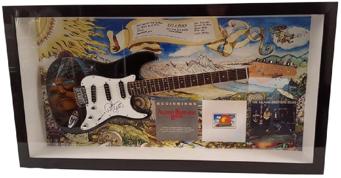 Dickey Betts Allman Brothers Band Signed Guitar Framed: "Dickey Betts" from the "Allman Brothers Band" framed and autographed "Focus by Kramer" guitar painted with custom airbrush artwork. Framed in a black shadow box with a plexiglass display. Includes ce