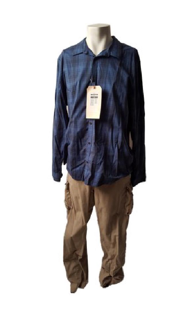 Patriots Day Ed Davis (John Goodman) Movie Costumes: Direct from the CBS Films production Patriots Day is Ed Davis (John Goodman) screen worn, dark blue "Calvin Klein" plaid button down shirt(XXL) and a pair of beige "True Nation" cargo pants(44X34). Wa
