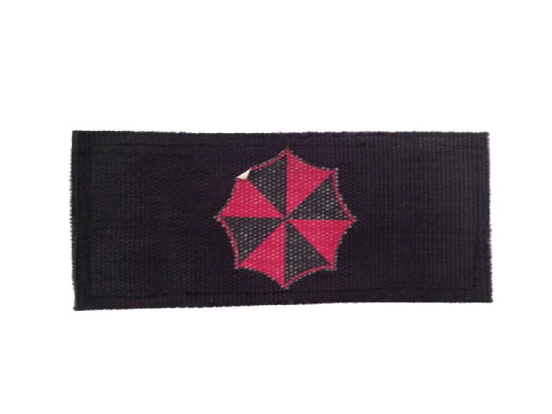 Resident Evil: The Final Chapter Trooper Patch Movie: Umbrella Trooper Patch with the Umbrella Corp logo (Approx. 5" x 2"). Velcro on the back of patch to adhere to the Trooper jackets.