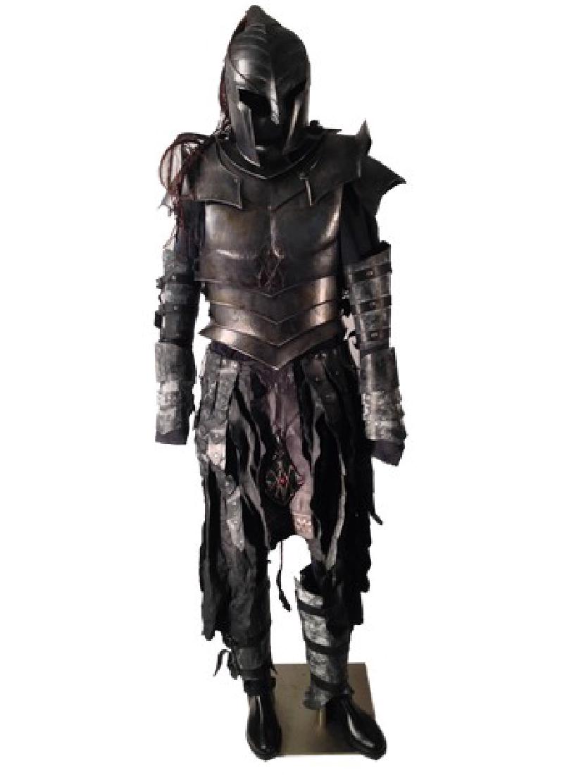 Underworld: Rise of the Lycans Death Dealer Movie: Death Dealer costume. Includes plastic helmet, plastic chest armor with shoulder and neck armor, gauntlets, braided leather skirt with emblem, leg armor, boots, cloth pants and undershirt
