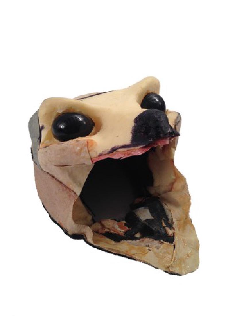 Awakening: Lycan Prosthetic Skull Movie Props: Foam Lycan prosthetic skull with plastic eyeballs and fangs with production marker pen sketching around the nose and eye sockets. Used in Underworld: Awakening and Underworld: Rise of the Lycans. (13x