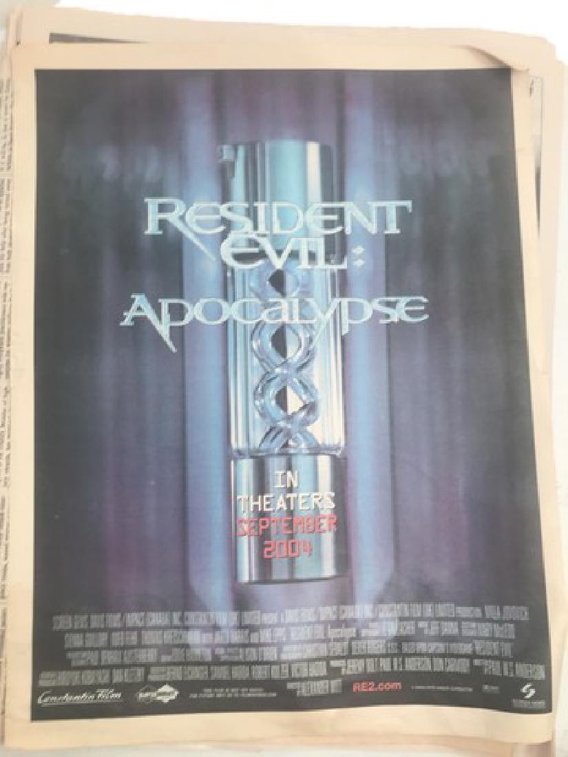 Resident Evil Raccoon City Times Paper Movie Props: Resident Evil (2002) - From the amazing inner world and video game favorite comes a Raccoon City Times screen used newspaper from the first film of the franchise. (approx. 14 1/2" x 12")