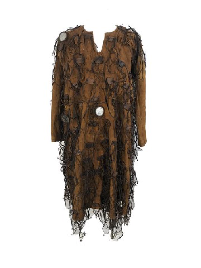 Star Wars: The Force Awakens Tunic Movie Costumes: Star Wars The Force Awakens (2015) From writer and director J.J. Abrams comes a great installment of the franchise and up for auction is a screen used light brown distressed canvas tunic with leather