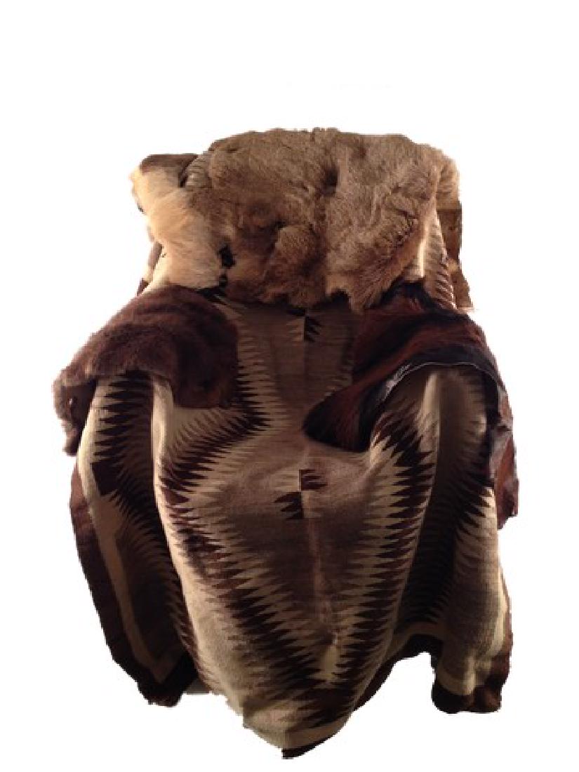 The Hateful Eight Sweet Dave (Gene Jones): Sweet Dave (Gene Jones) & Oswaldo Mobray (Tim Roth) screen used, hero, brown, grey, and white woven blanket from Sweet Dave's chair and animal pelts. (approx. 4' x 6')