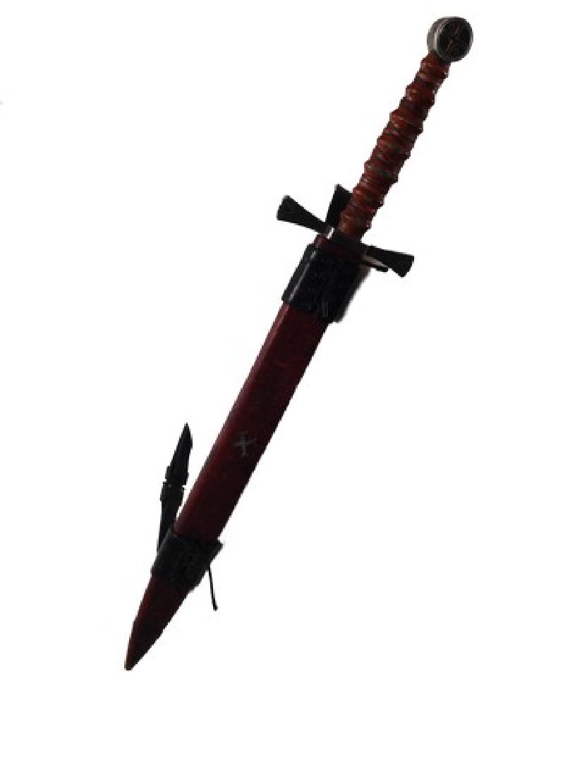 The Last Witchunter Kaulder (Vin Diesel) Hero Sword: Direct from the set and the studio from The Last Witch Hunter comes Kaulder's (Vin Diesel) hero screen used metal sword with brown leather scabbard. This is a very significant, hero prop, as it was th
