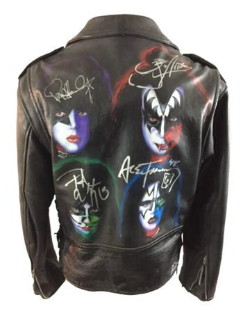 KISS Signed Jacket Music Memorabilia: One of a kind hand-painted and autographed leather jacket of the four original band members of KISS (Gene Simmons, Paul Stanley, Peter Criss and Ace Frehley). Features hand painted pictures of each me