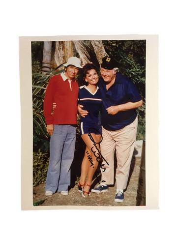 Gilligan's Island Dawn Wells Signed Photo Debbie: A promotional "8.5 X 11" portrait of the Bob Denver, Alan Hale Jr., and Dawn Wells posing on set of the 1964-1993 television series "Gilligan's Island" Photo is autographed by Dawn Wells. This amazing