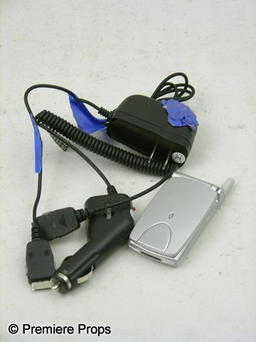 The Invention of Lying Anna McDoogles (Jennifer Ga: The Invention of Lying - As seen in the hit comedy, The Invention of Lying, this is Anna McDoogles' (Jennifer Garner) screen used gray plastic "LG" Cell phone with black plastic, rubber charger and ca