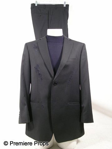 Resident Evil Afterlife Albert Wesker (Shawn Rober: Resident Evil Afterlife - From the set, this is Albert Wesker (Shawn Roberts) screen worn, hero, black two button with front pockets, shoulder pads, bloody scrapes on the front, 'DKNY' suit jacket, (s