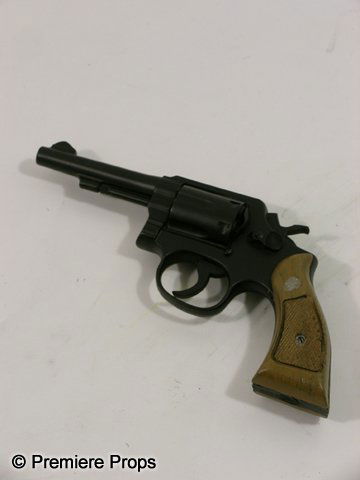 The Road Man (Viggo Mortensen) Pistol Movie Props: The Road -Hero, screen used, black with brown handle, 'Smith & Wesson' rubber pistol with intricate detail. (approx. 9 1/2" long)(TRD2010)