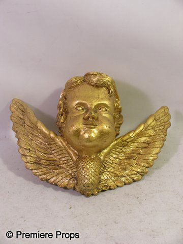 Angels and Demons Angel Head With Wings Movie Prop: Angels and Demons - From Angeles and Demons, this is a gold painted molded angel head from a large church set piece. This head has a screw in the back. (approx. 13 1/2" x 11") (EA2008)