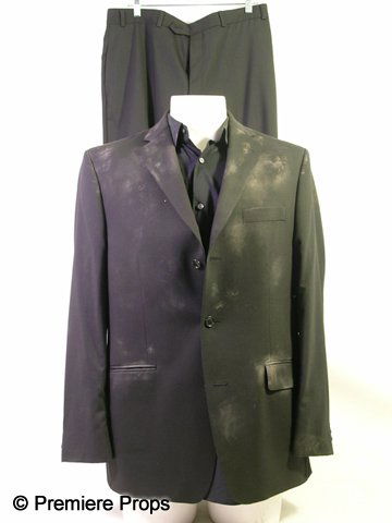 Resident Evil Afterlife Albert Wesker (Shawn Rober: Resident Evil Afterlife - As seen in Resident Evil Afterlife, this is Albert Wesker's (Shawn Roberts) screen worn, very dirty with some holes, black three button 'Calvin Klein' suit jacket, (size 42R)