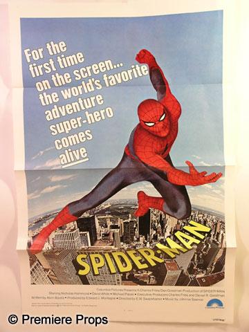 Spider-Man Large One-Sheet Poster Movie Props: Spider-Man (1977) - This is a 'Spider-Man' poster with Spider-Man soaring across a downtown scene. (approx. 40" x 27") (EA2006)