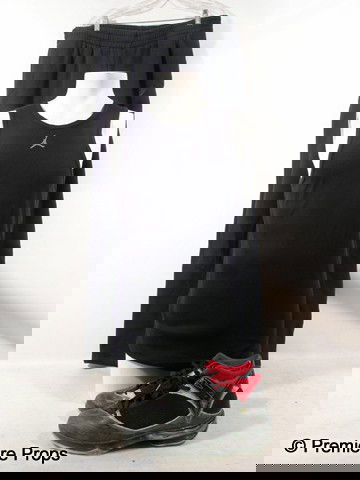 Resident Evil Afterlife Luther West Movie Costumes: Resident Evil Afterlife - Luther West's screen worn, hero, black with 'Air Jordan' logo on the front 'Nike' tank top, (size XL) dirty black with 'Nike Swoosh' logo on the side, elastic waist with pock