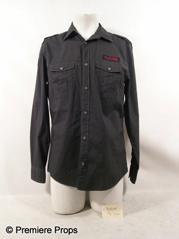 Resident Evil Afterlife Umbrella Technician Shirt : Resident Evil Afterlife - Umbrella Technician's screen worn, long sleeve dark grey, button up the front with collar, Umbrella logo on the right arm, black sewn in pieces on the shoulders, Japanese wri